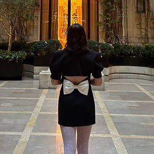 Nana Jacqueline iconic black bow dress